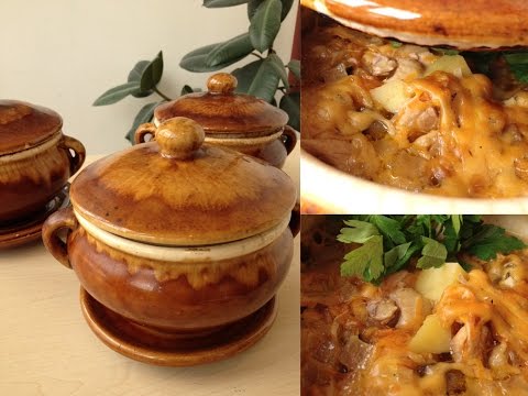 Oven in pots with potatoes