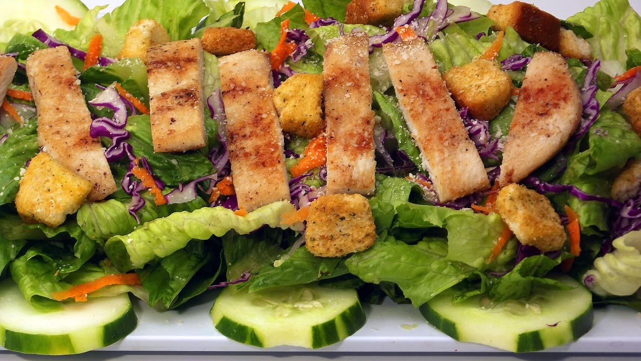Photo of serving Caesar salad