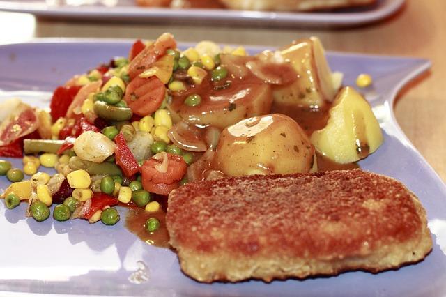 Fish cakes with a side dish of vegetables