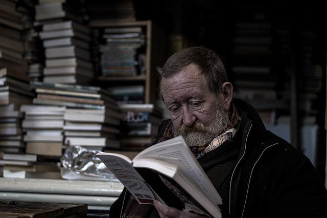 Old man reads