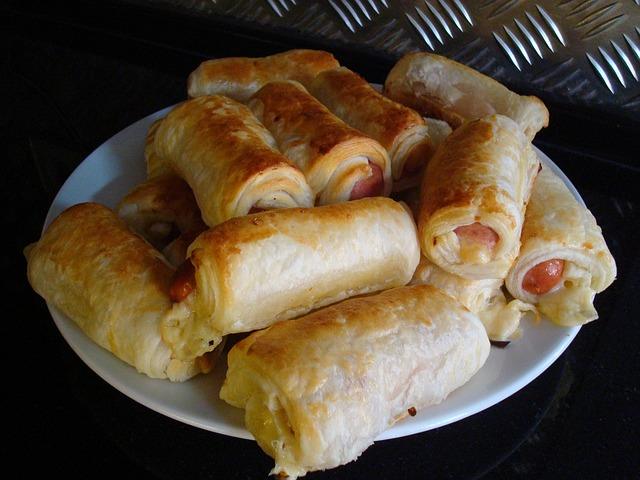 Delicious yeast sausages in pastry