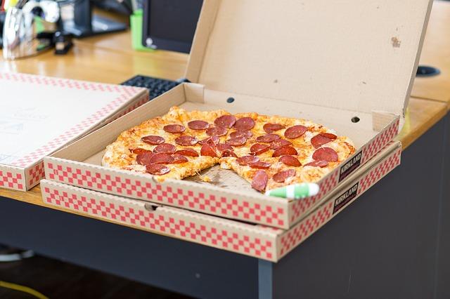 Open pepperoni pizza box
