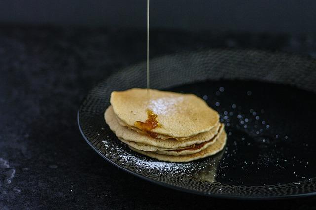 Beautiful photo of pancakes with honey